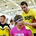 Nik Stauskas signs t-shirts and other apparel after camp on Tuesday, July 9. Daniel Brenner I AnnArbor.com